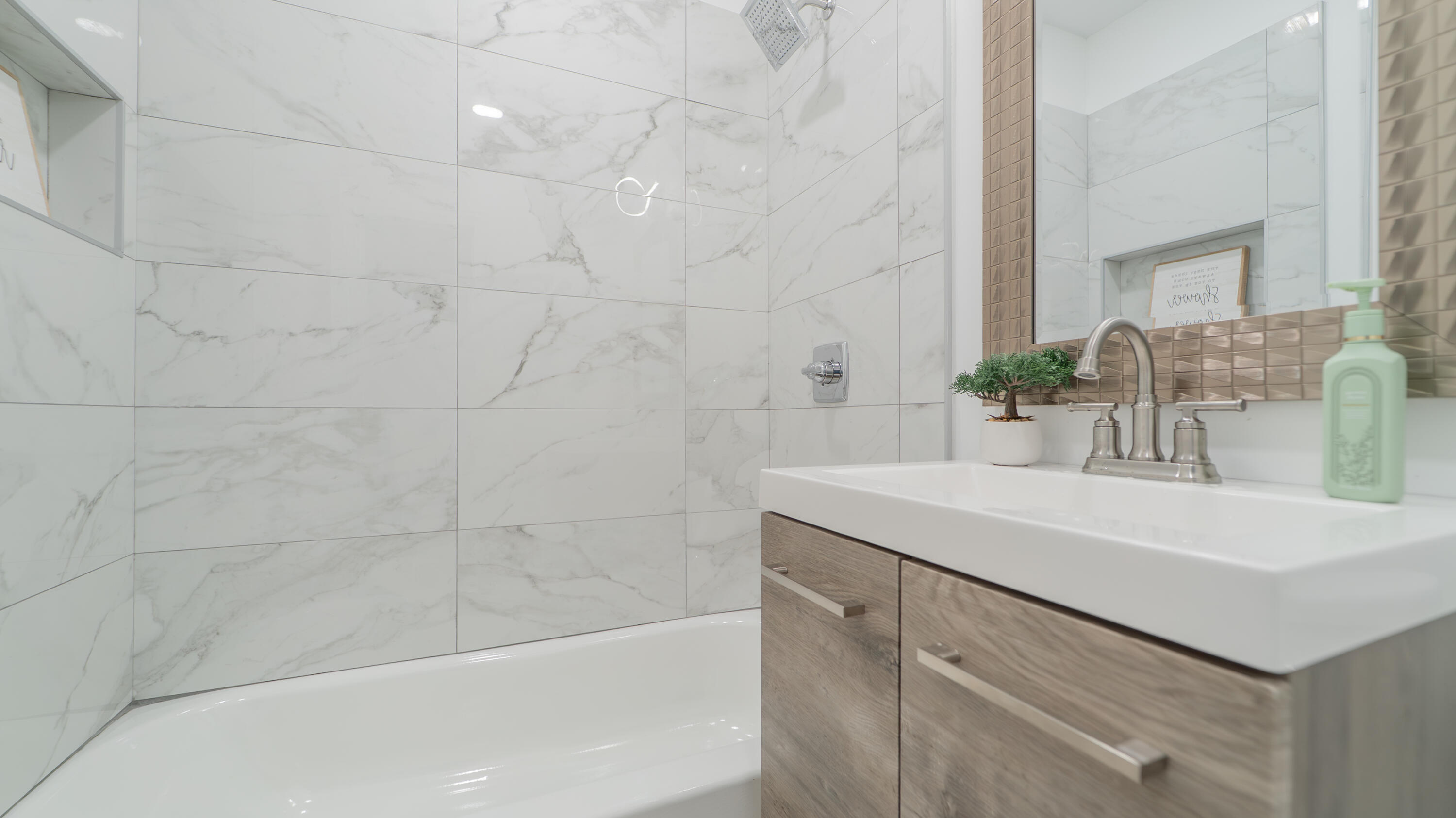 855 Fayette Street Gary, IN 46403 - Photo 14 of 25 a bathroom with a sink a vanity and a bathtub