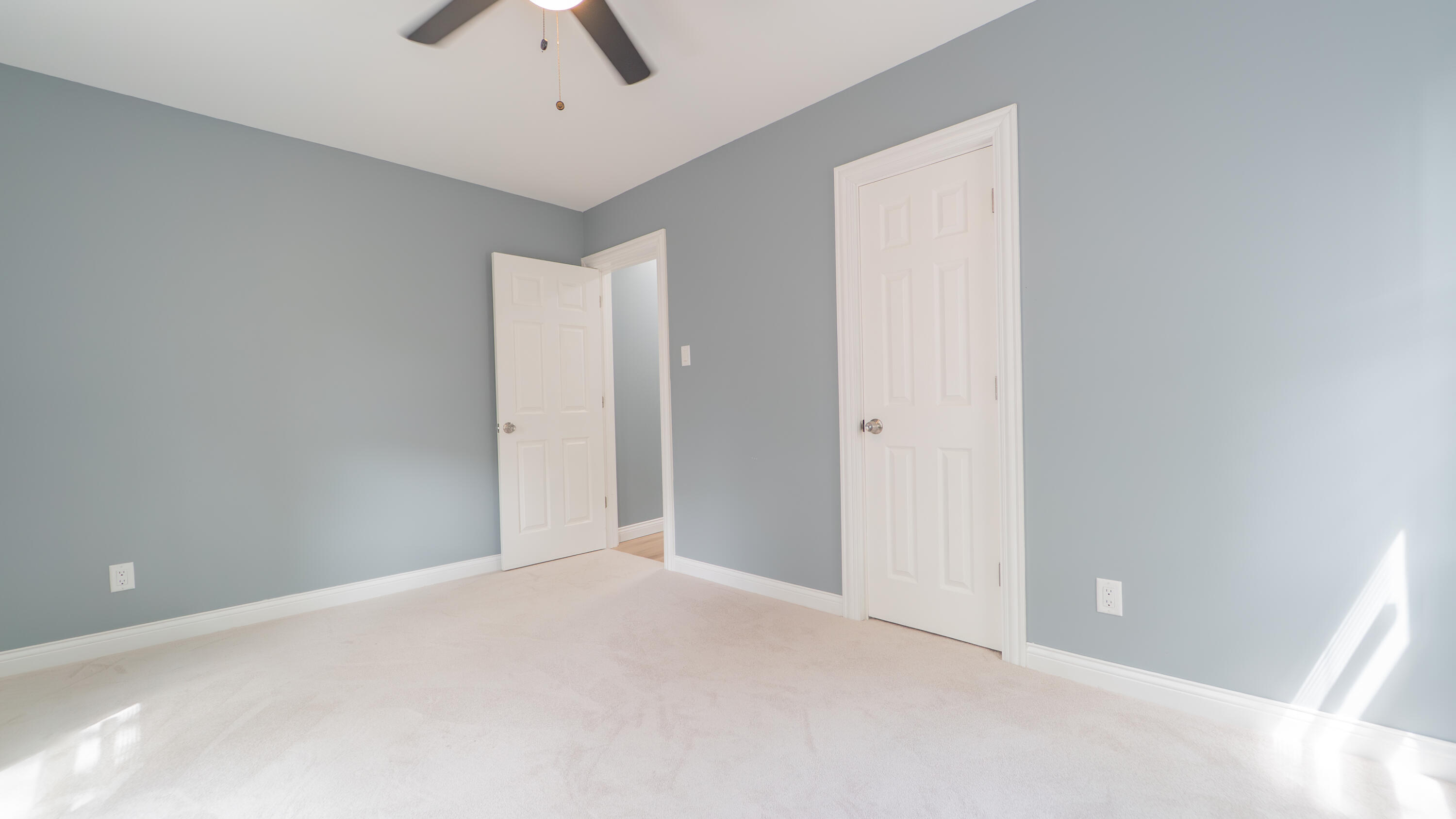 855 Fayette Street Gary, IN 46403 - Photo 16 of 25 an empty room with fan and windows