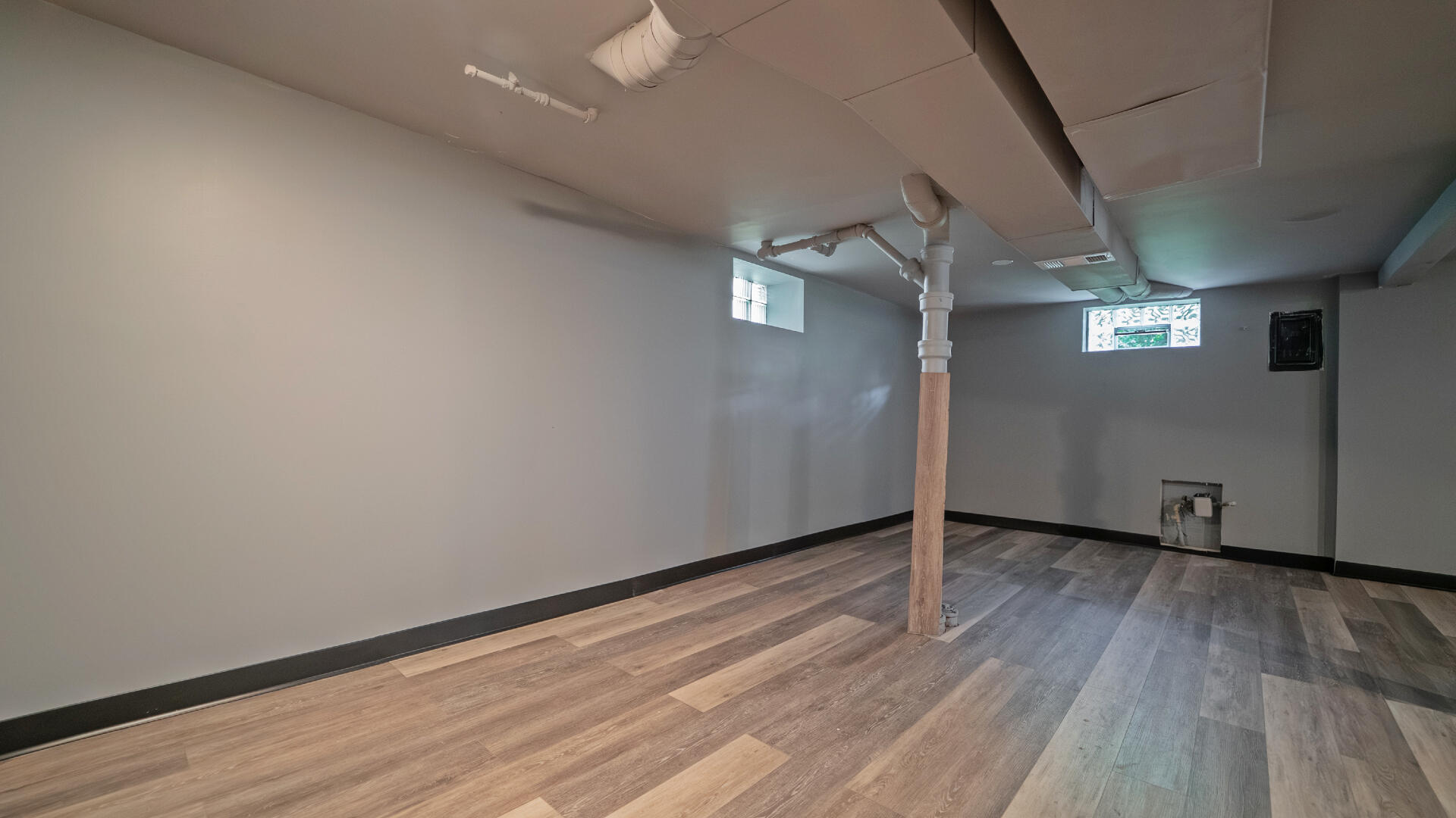 855 Fayette Street Gary, IN 46403 - Photo 20 of 25 wooden floor in an empty room with a window
