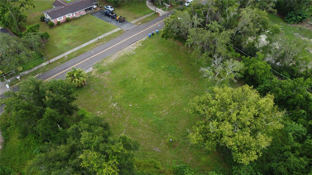 10616 Davis Road Tampa, FL 33637 - Photo 2 of 8 a view of a yard with a house