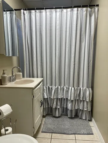 a bathroom with a sink and a toilet