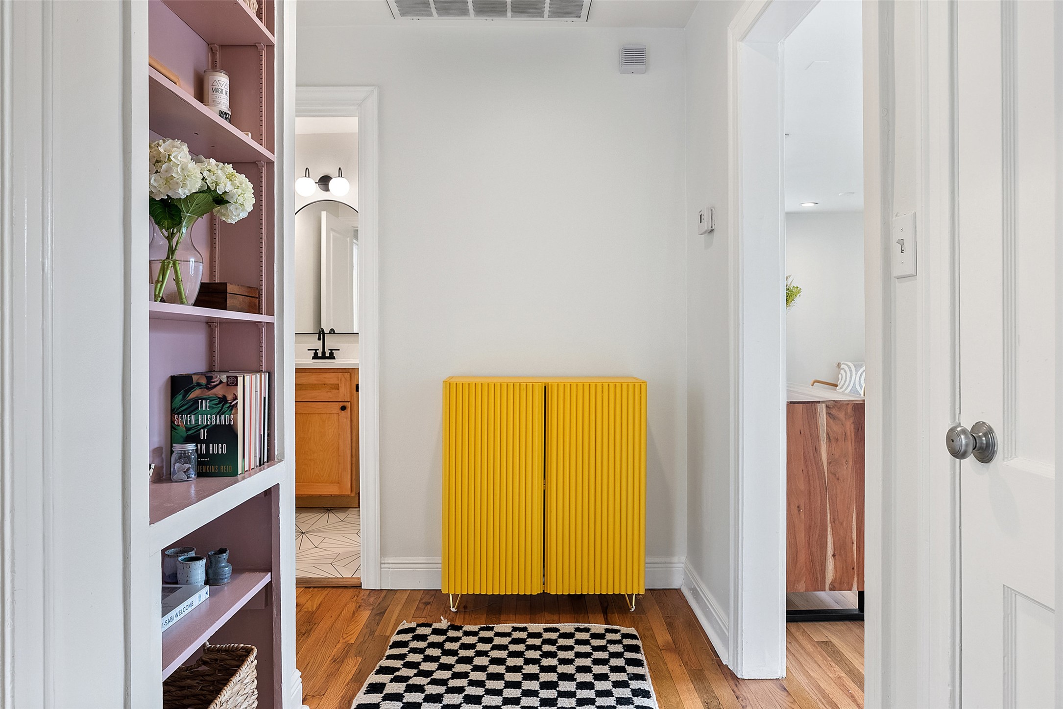 1410 Sanchez Street Austin, TX 78702 - Photo 20 of 30 Mudroom featuring wood finished floors and baseboards