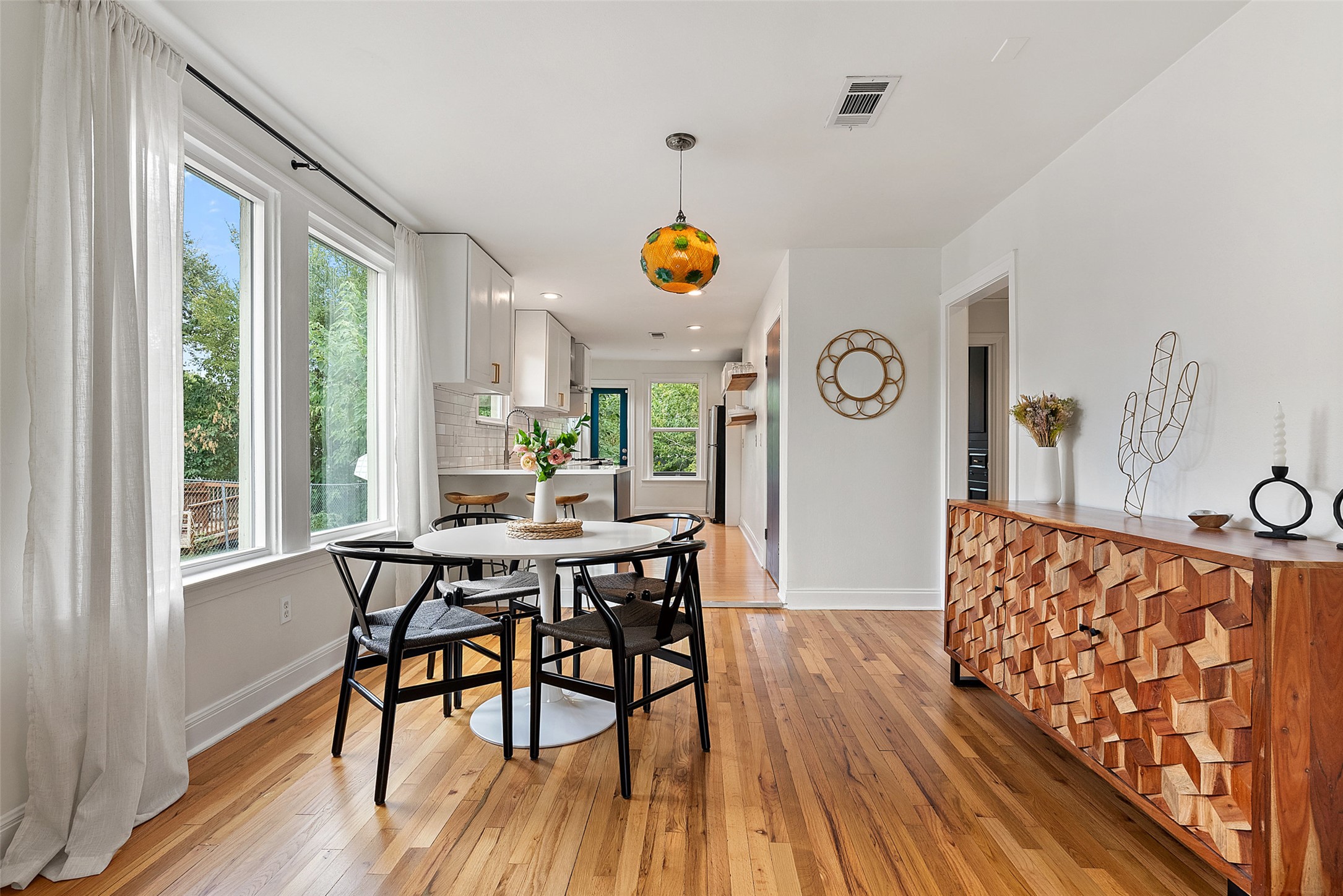 1410 Sanchez Street Austin, TX 78702 - Photo 3 of 30 Dining room featuring light wood-style floors and recessed lighting