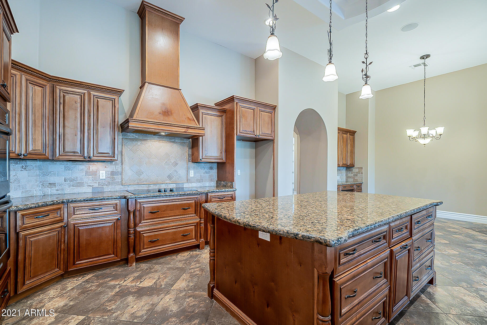 2789 East Ridgewood Lane Gilbert, AZ 85298 - Photo 14 of 60 a kitchen with stainless steel appliances granite countertop a sink a stove and a wooden floor