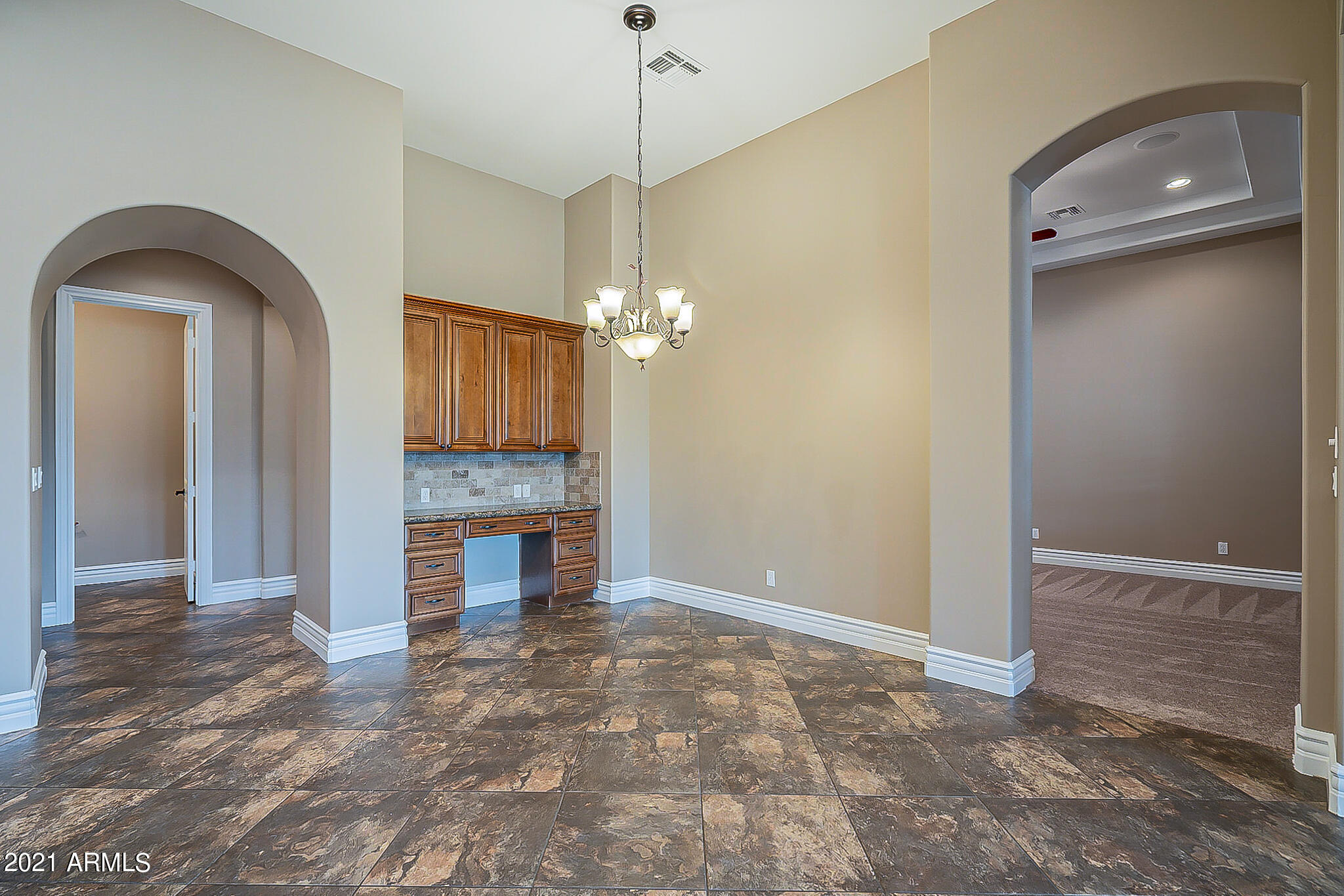 2789 East Ridgewood Lane Gilbert, AZ 85298 - Photo 15 of 60 a view of a livingroom with a fireplace