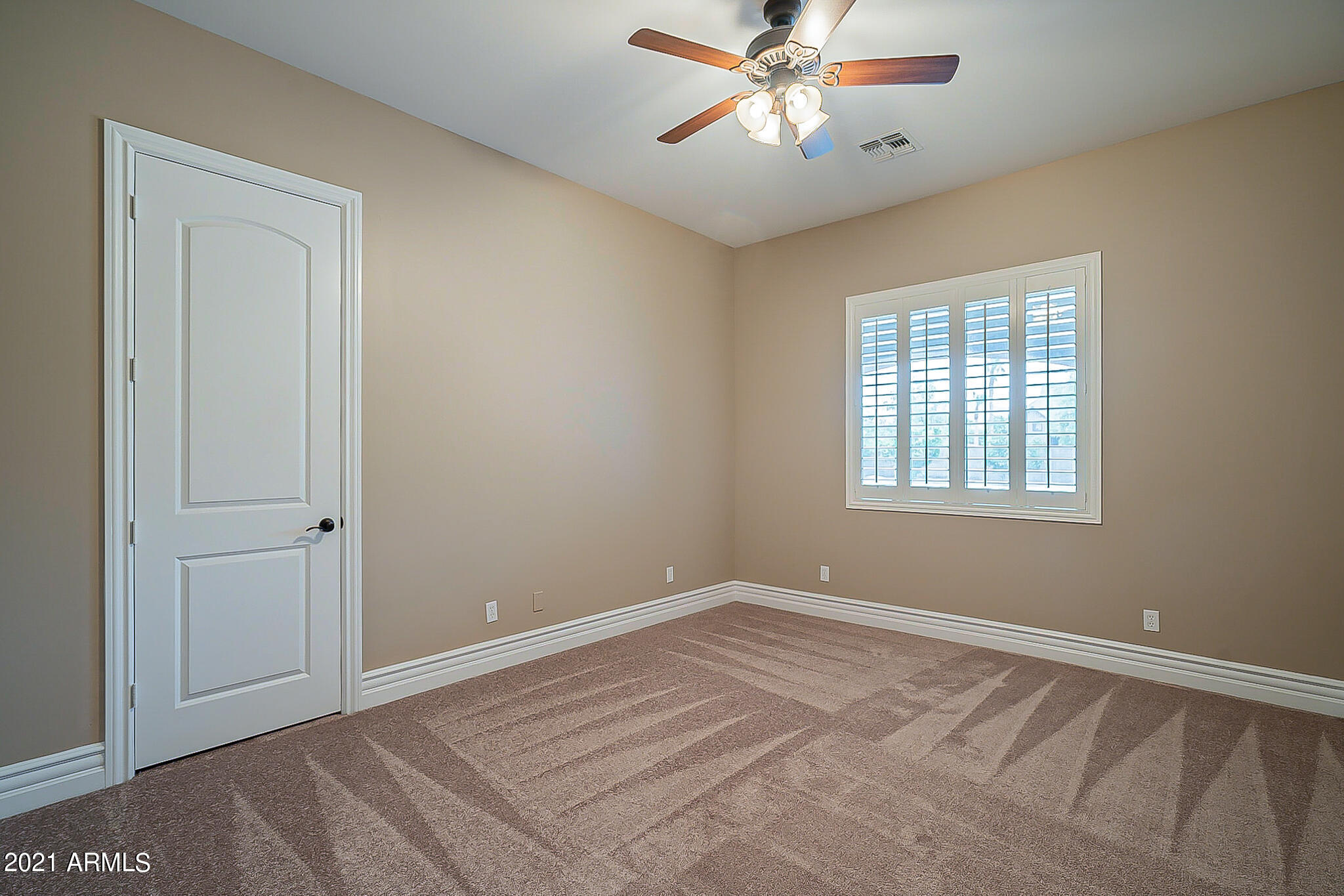 2789 East Ridgewood Lane Gilbert, AZ 85298 - Photo 22 of 60 a view of an empty room with a window