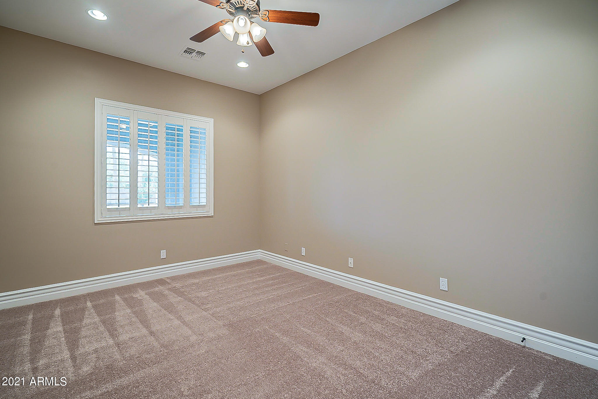 2789 East Ridgewood Lane Gilbert, AZ 85298 - Photo 25 of 60 a view of an empty room with a window