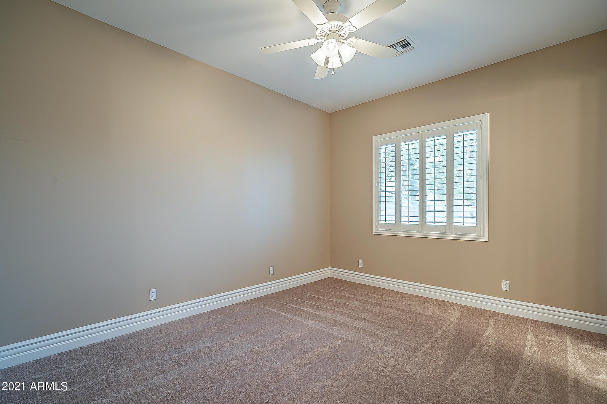2789 East Ridgewood Lane Gilbert, AZ 85298 - Photo 29 of 60 an empty room with a window