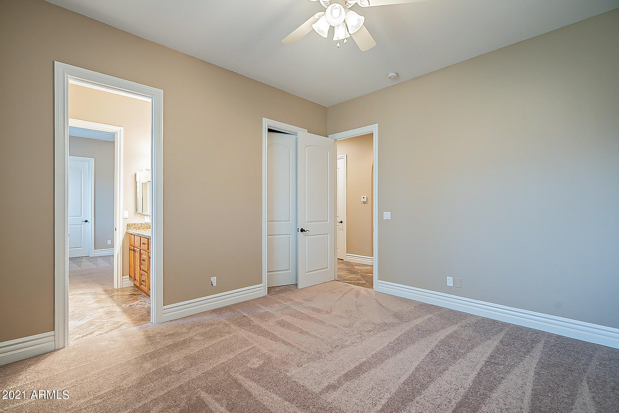 2789 East Ridgewood Lane Gilbert, AZ 85298 - Photo 30 of 60 a view of a room with a stylish ceiling fan and entryway
