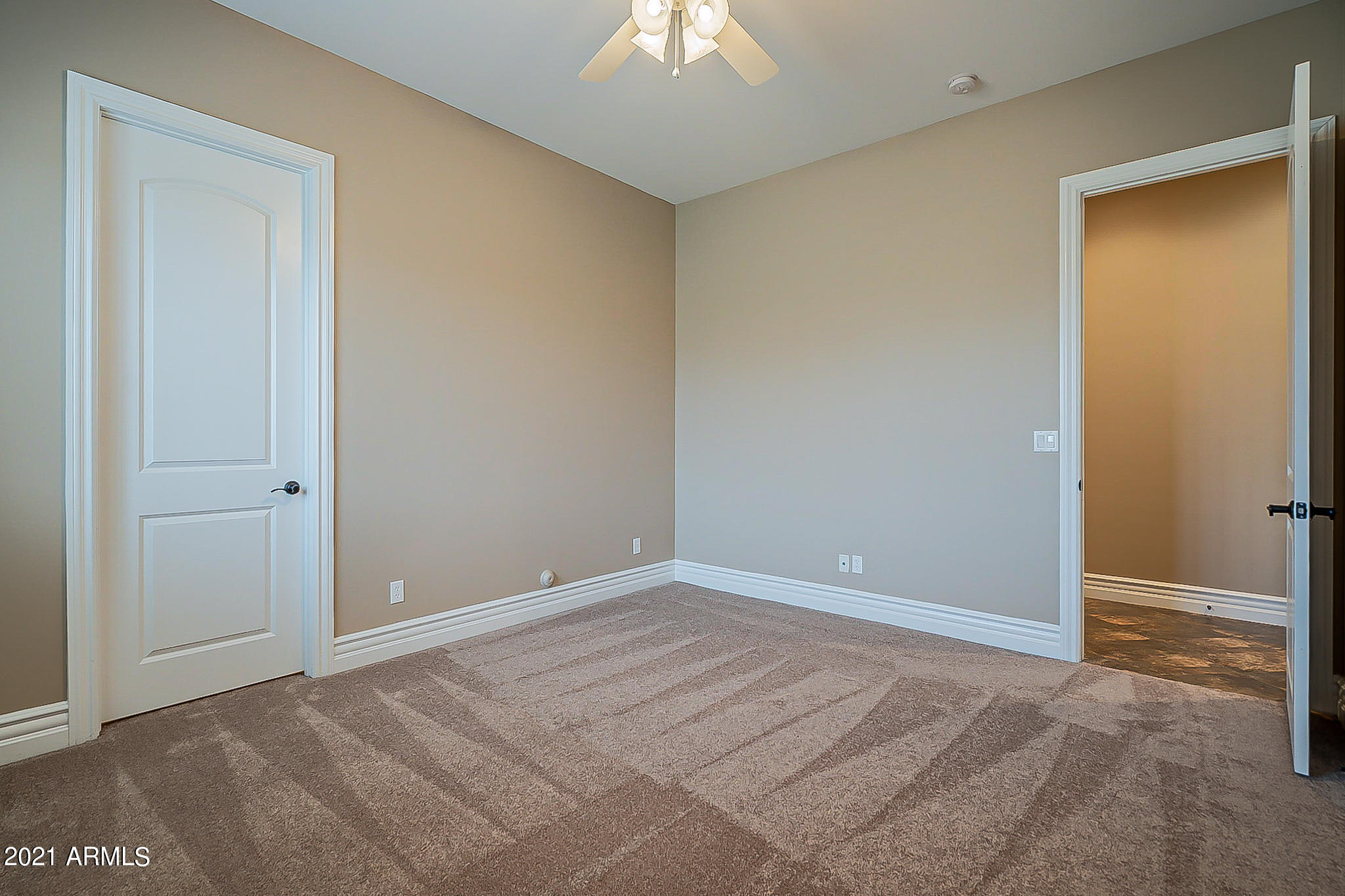 2789 East Ridgewood Lane Gilbert, AZ 85298 - Photo 34 of 60 a view of an empty room and chandelier fan