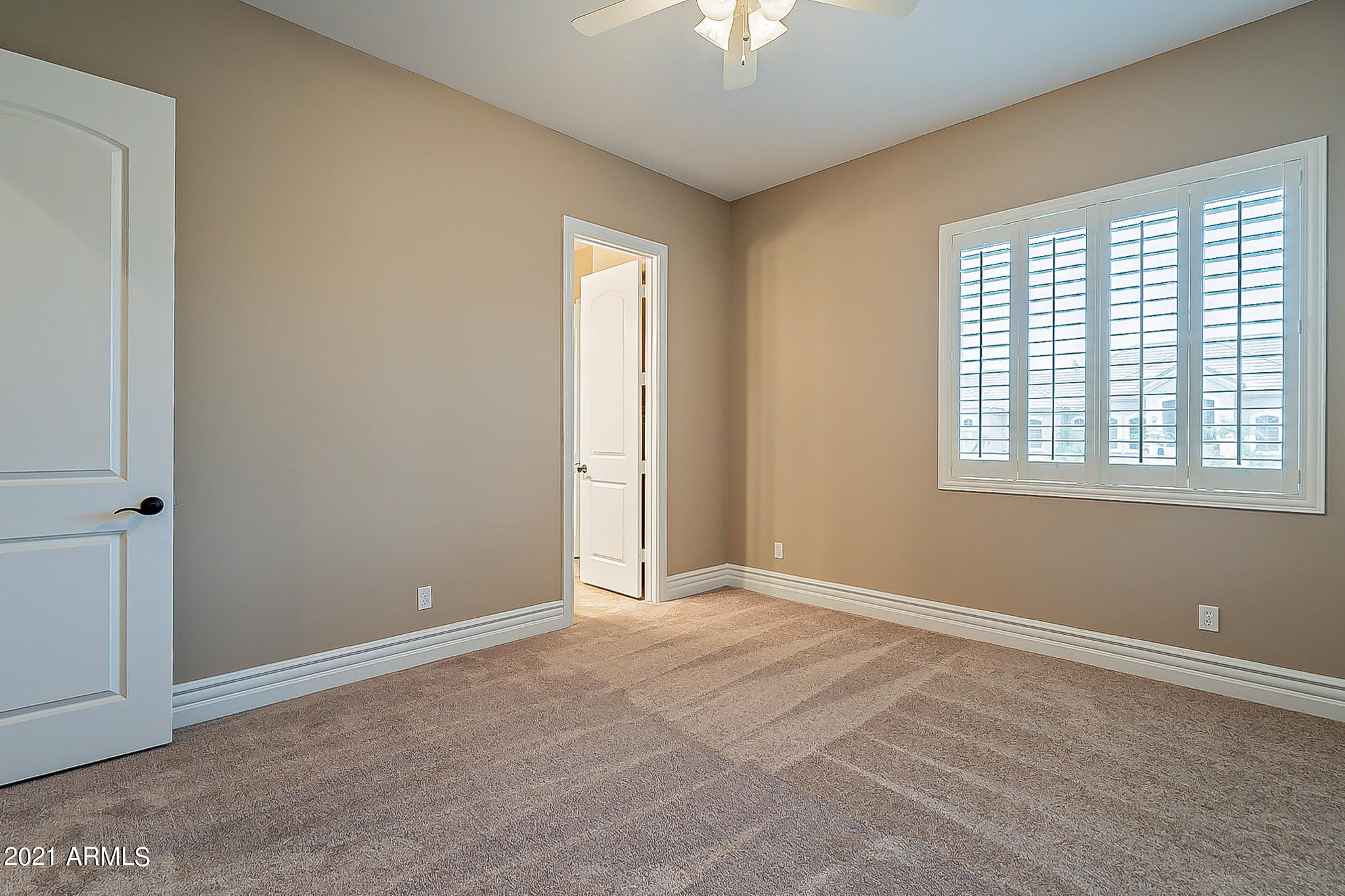 2789 East Ridgewood Lane Gilbert, AZ 85298 - Photo 35 of 60 a view of an empty room with a window