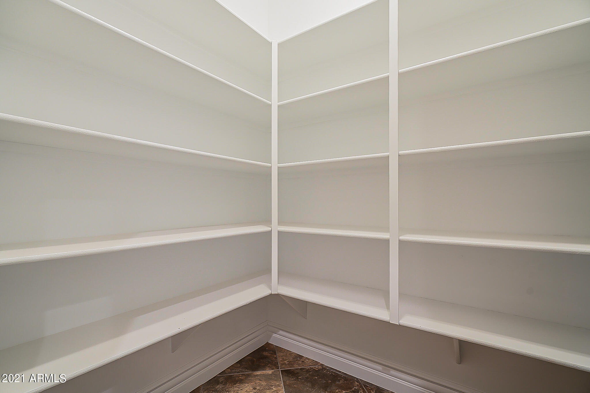 2789 East Ridgewood Lane Gilbert, AZ 85298 - Photo 36 of 60 a view of an empty walk in closet