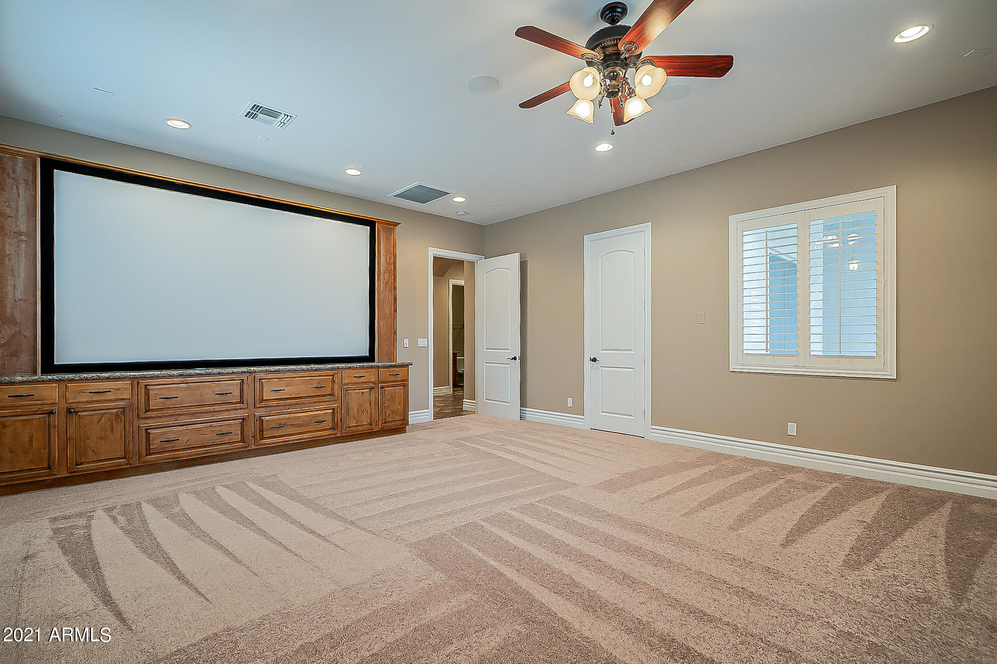 2789 East Ridgewood Lane Gilbert, AZ 85298 - Photo 43 of 60 a bedroom with a bed and a flat screen tv