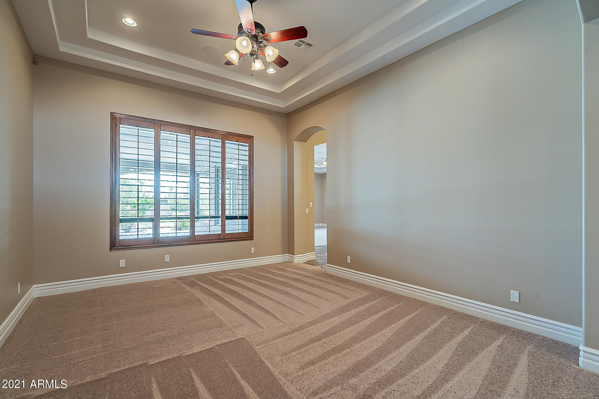 2789 East Ridgewood Lane Gilbert, AZ 85298 - Photo 5 of 60 a view of an empty room with a window