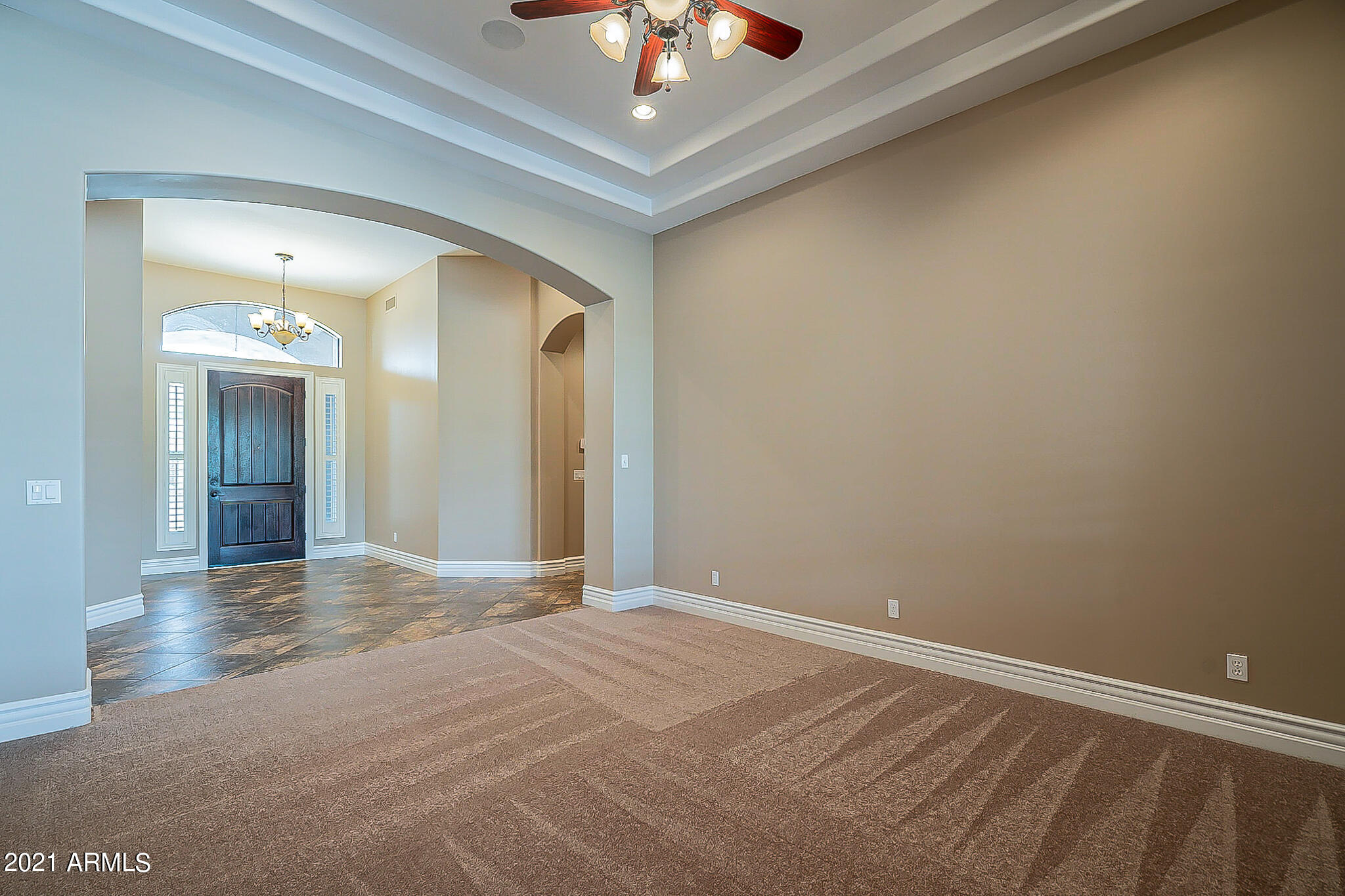 2789 East Ridgewood Lane Gilbert, AZ 85298 - Photo 6 of 60 a view of an empty room and chandelier fan