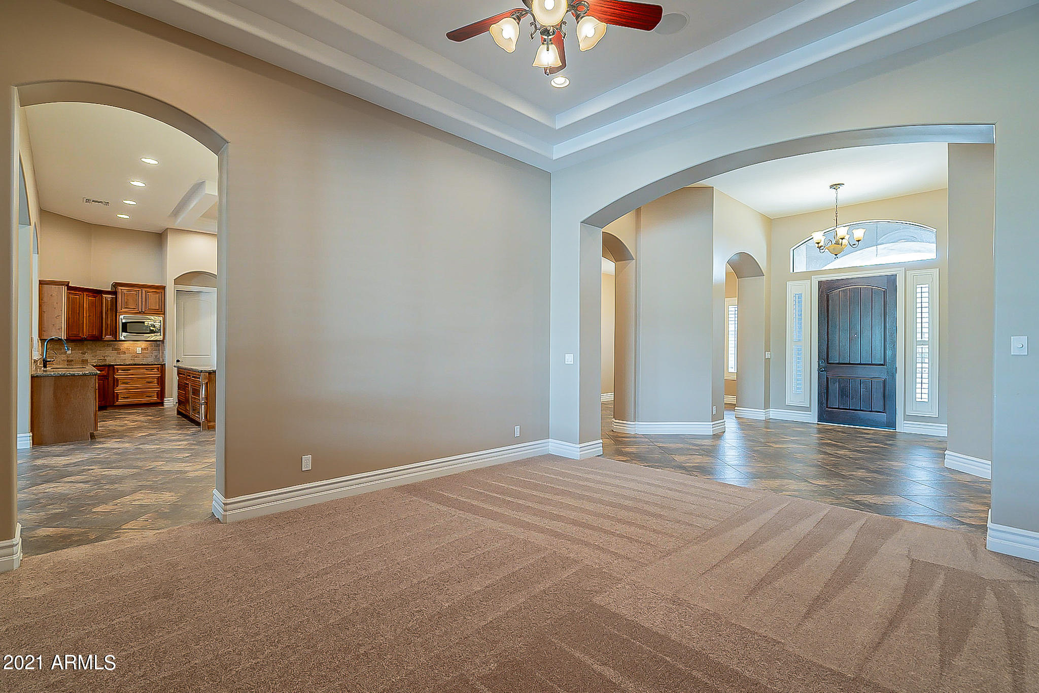 2789 East Ridgewood Lane Gilbert, AZ 85298 - Photo 8 of 60 a view of a livingroom with a chandelier