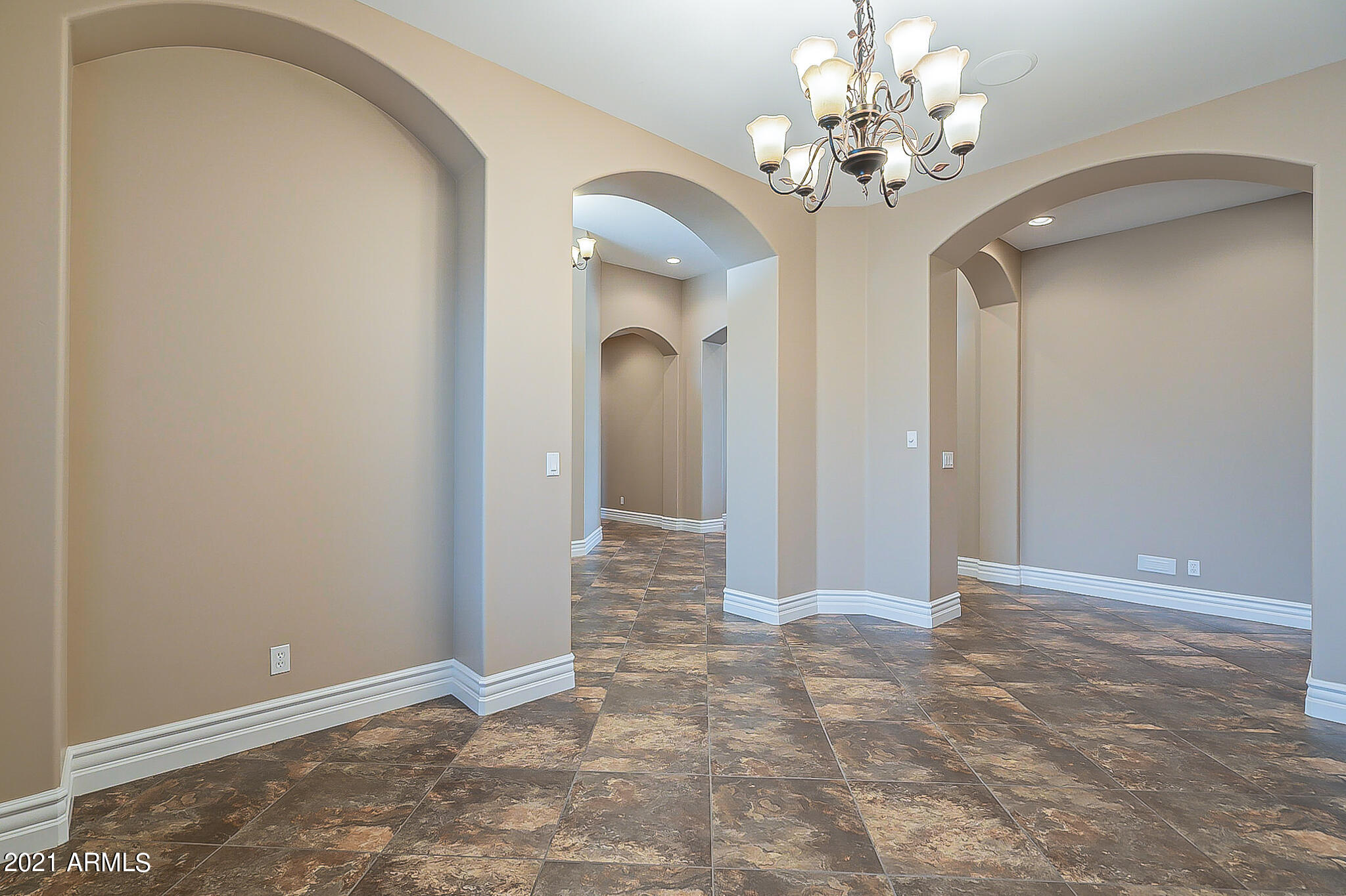 2789 East Ridgewood Lane Gilbert, AZ 85298 - Photo 9 of 60 a view of a chandelier in big room and chandelier