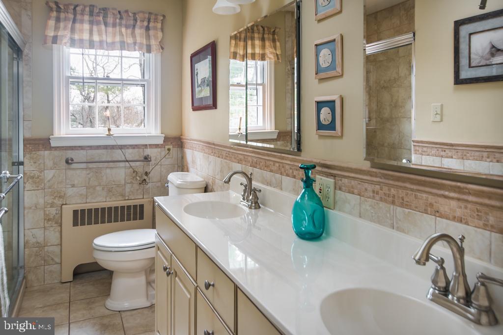 8924 Satyr Hill Road Baltimore, MD 21234 - Photo 16 of 38 Master bath with double sinks and large shower