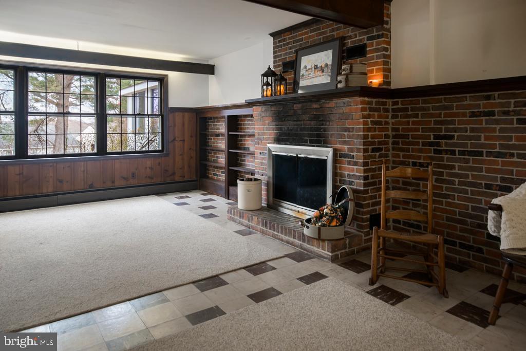 8924 Satyr Hill Road Baltimore, MD 21234 - Photo 26 of 38 Large windows and a door leads to brick patio