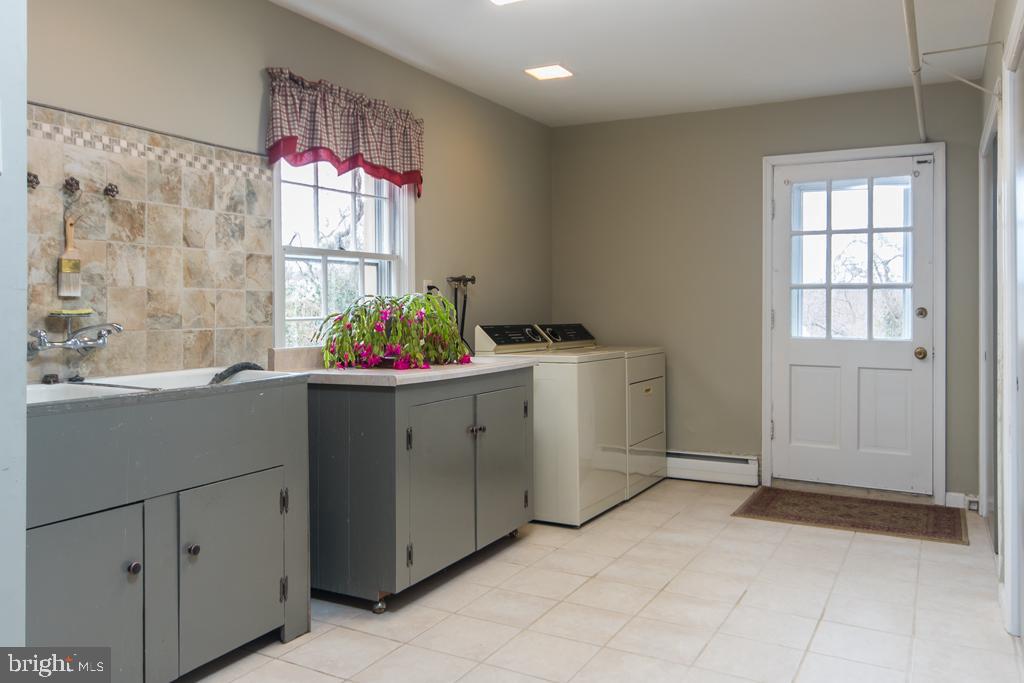 8924 Satyr Hill Road Baltimore, MD 21234 - Photo 31 of 38 Who wouldn't love the size of this laundry room?