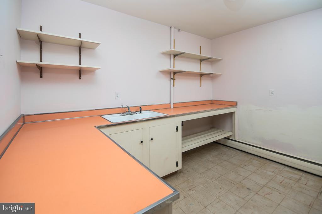 8924 Satyr Hill Road Baltimore, MD 21234 - Photo 32 of 38 Dark room would easily convert to kitchenette