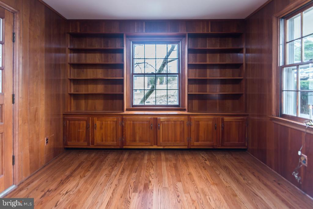 8924 Satyr Hill Road Baltimore, MD 21234 - Photo 7 of 38 Pocket door leads to office w/cherry wood finishes