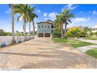 a view of outdoor space with palm trees