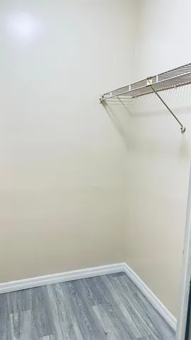 a view of a room with racks on the wall