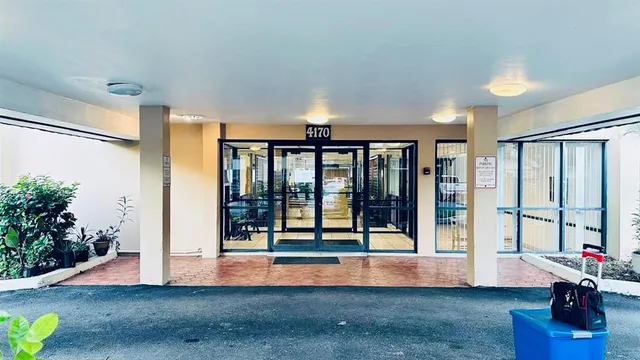 a view of lobby with furniture and floor to ceiling window