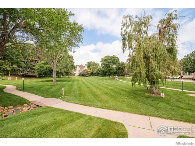 a view of a golf course with a garden