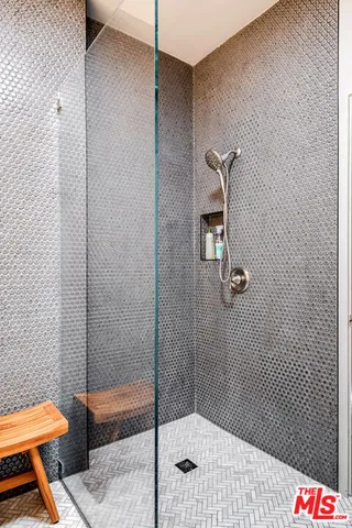 a bathroom with a sink and mirror