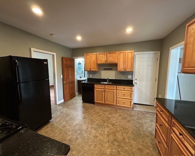 5 Anna Street Worcester, MA 01604 - Photo 4 of 19 a kitchen with granite countertop a refrigerator and a sink