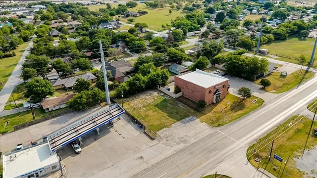 an aerial view of a house with a garden
