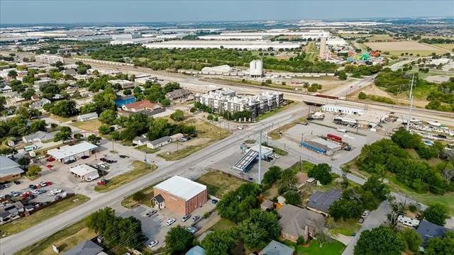 an aerial view of beach and city
