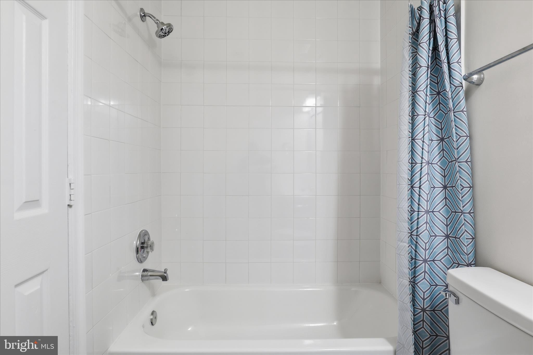 11301 Kessler Place Manassas, VA 20109 - Photo 26 of 52 a bathroom with a bathtub and shower