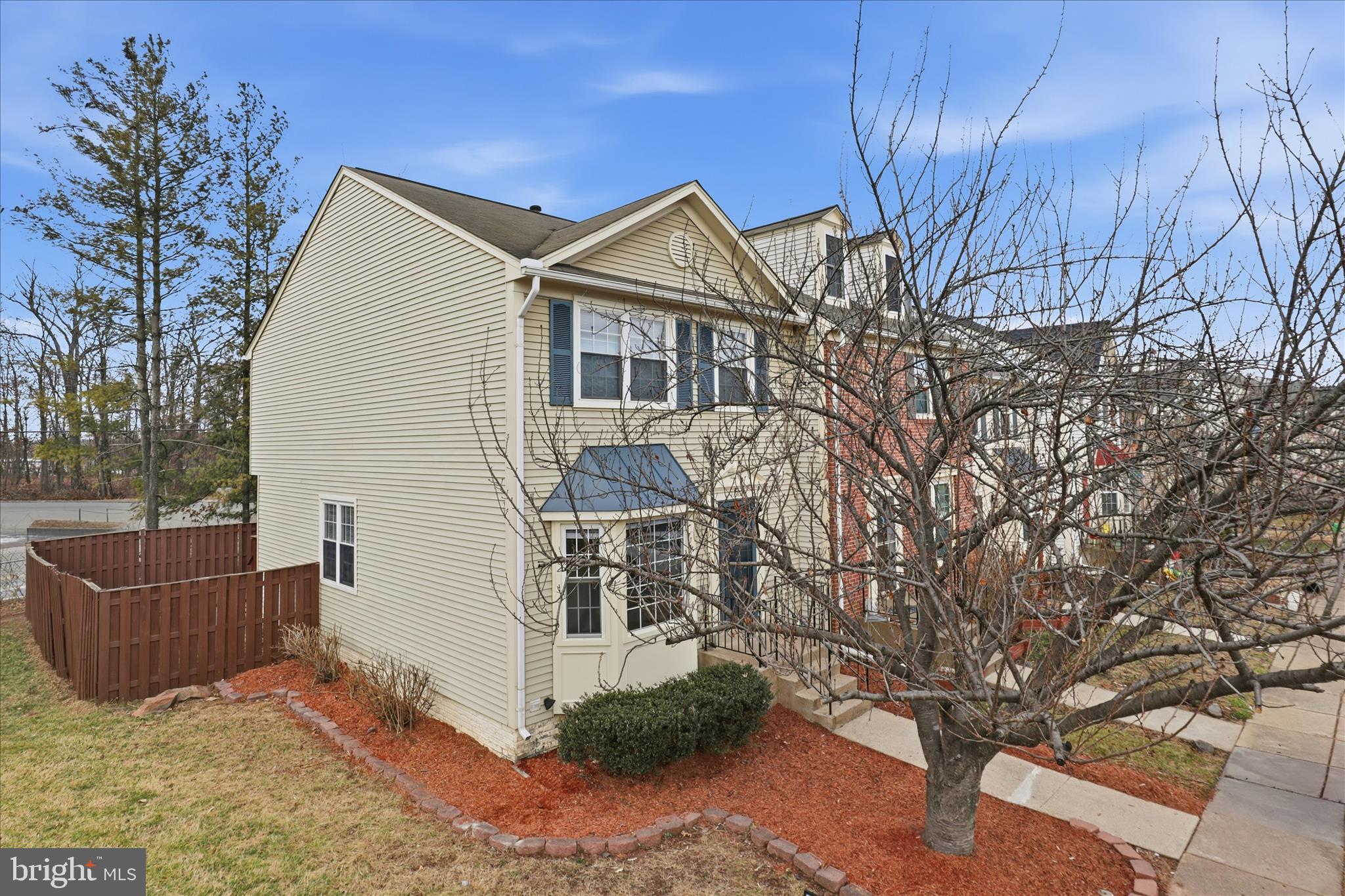 11301 Kessler Place Manassas, VA 20109 - Photo 3 of 52 a view of house with a yard
