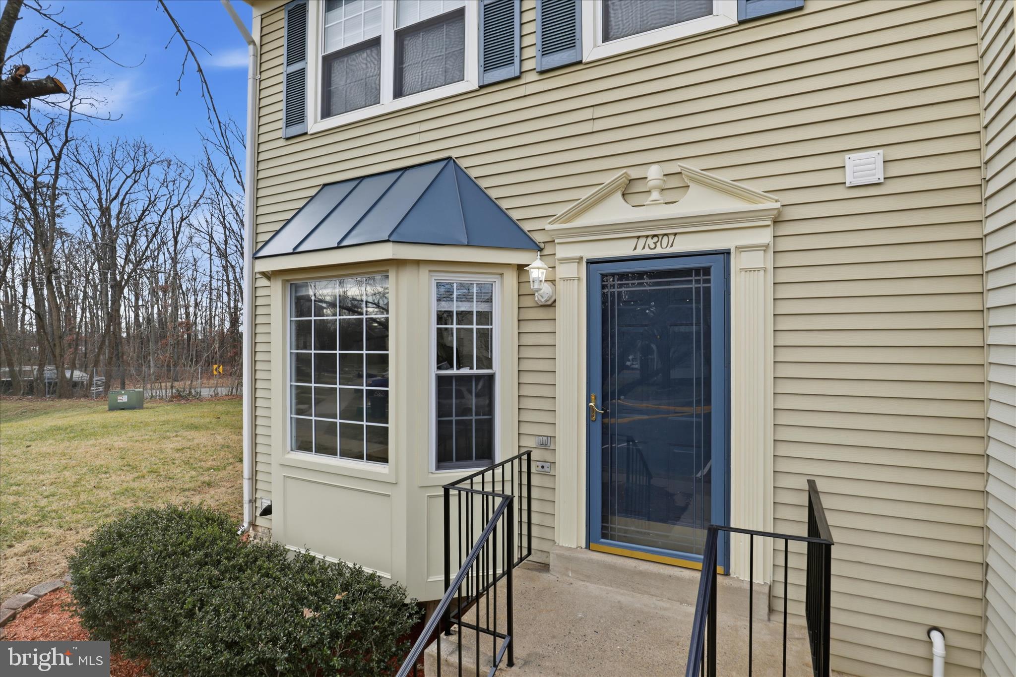 11301 Kessler Place Manassas, VA 20109 - Photo 5 of 52 a view of a house with backyard and garden