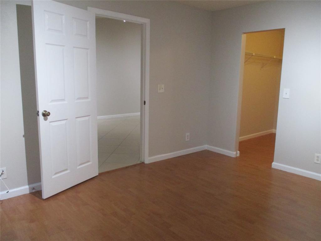 22052 Palms Way, Unit 205 Boca Raton, FL 33433 - Photo 12 of 28 an empty room with closet area