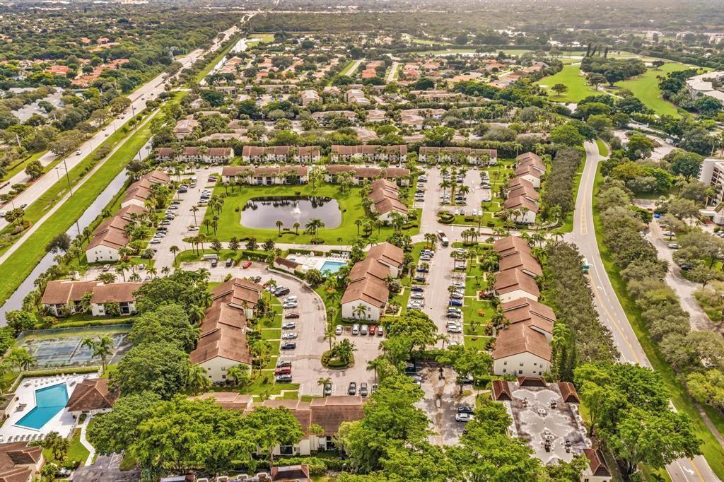 22052 Palms Way, Unit 205 Boca Raton, FL 33433 - Photo 25 of 28 an aerial view of residential houses with outdoor space