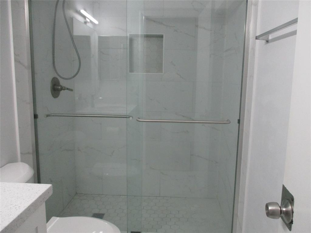 22052 Palms Way, Unit 205 Boca Raton, FL 33433 - Photo 8 of 28 a bathroom with a shower