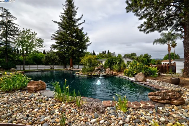 a view of lake with green space