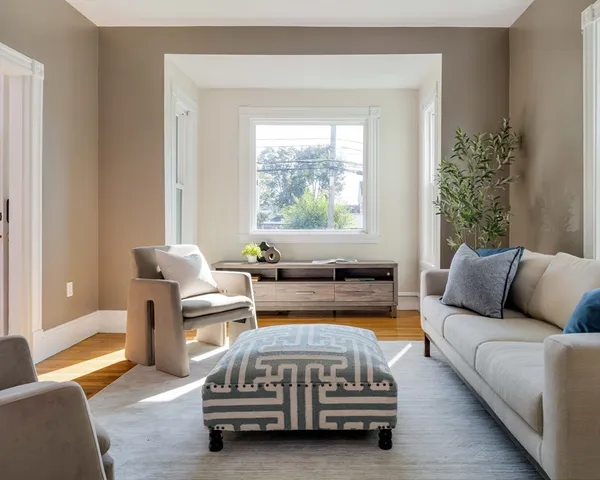 a bedroom with furniture and a window