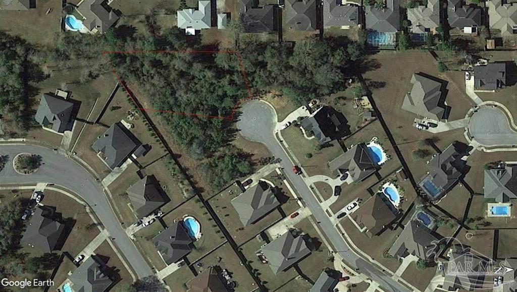953 Grindstone Lane Cantonment, FL 32533 - Photo 3 of 6 an aerial view of a house with a yard and outdoor seating