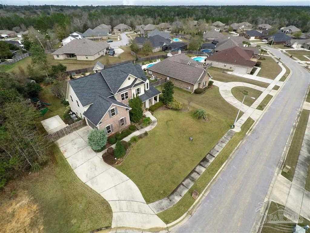 953 Grindstone Lane Cantonment, FL 32533 - Photo 6 of 6 an aerial view of a house with a lake view
