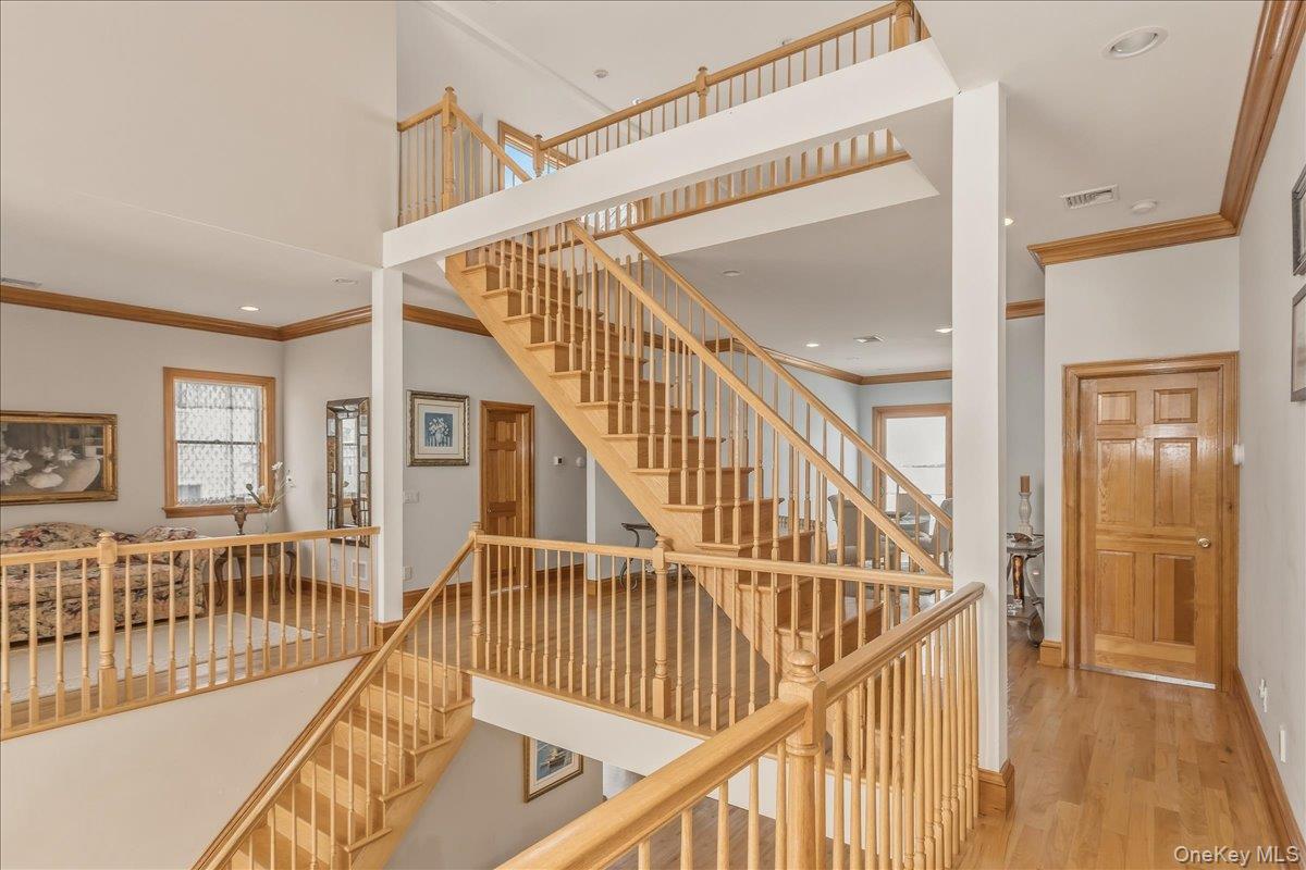 672 Dune Road Westhampton Beach, NY 11978 - Photo 21 of 38 a view of entryway with wooden floor