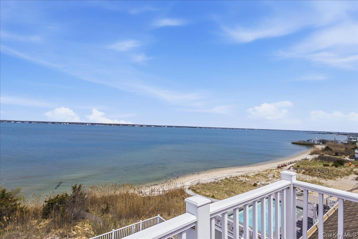 672 Dune Road Westhampton Beach, NY 11978 - Photo 35 of 38 a view of ocean from a balcony