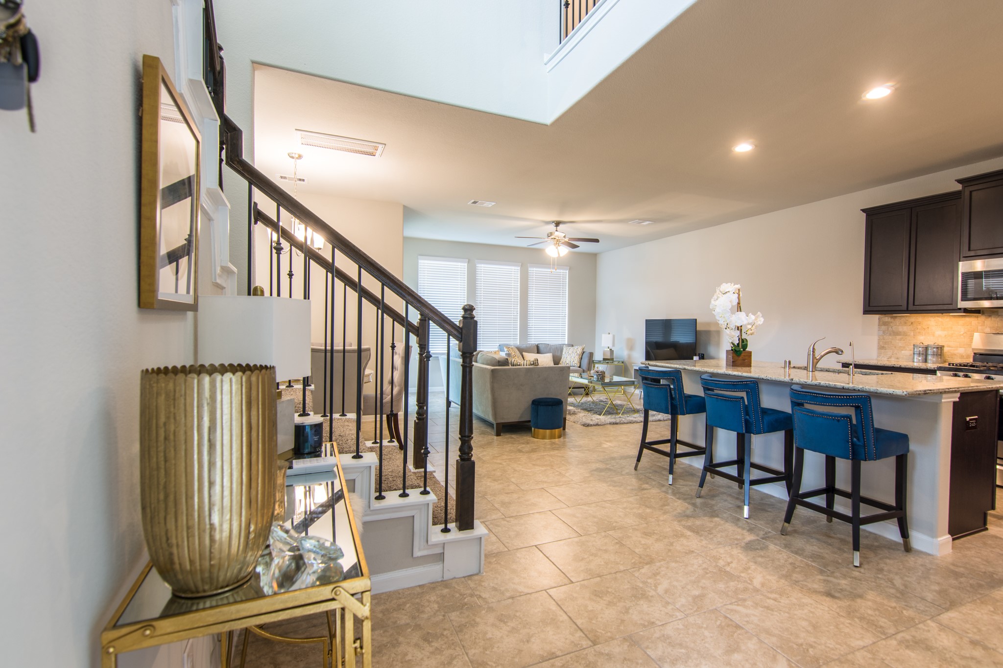 3311 Rainflower Springs Lane Rosenberg, TX 77471 - Photo 16 of 35 a living room with lots of furniture and a large window