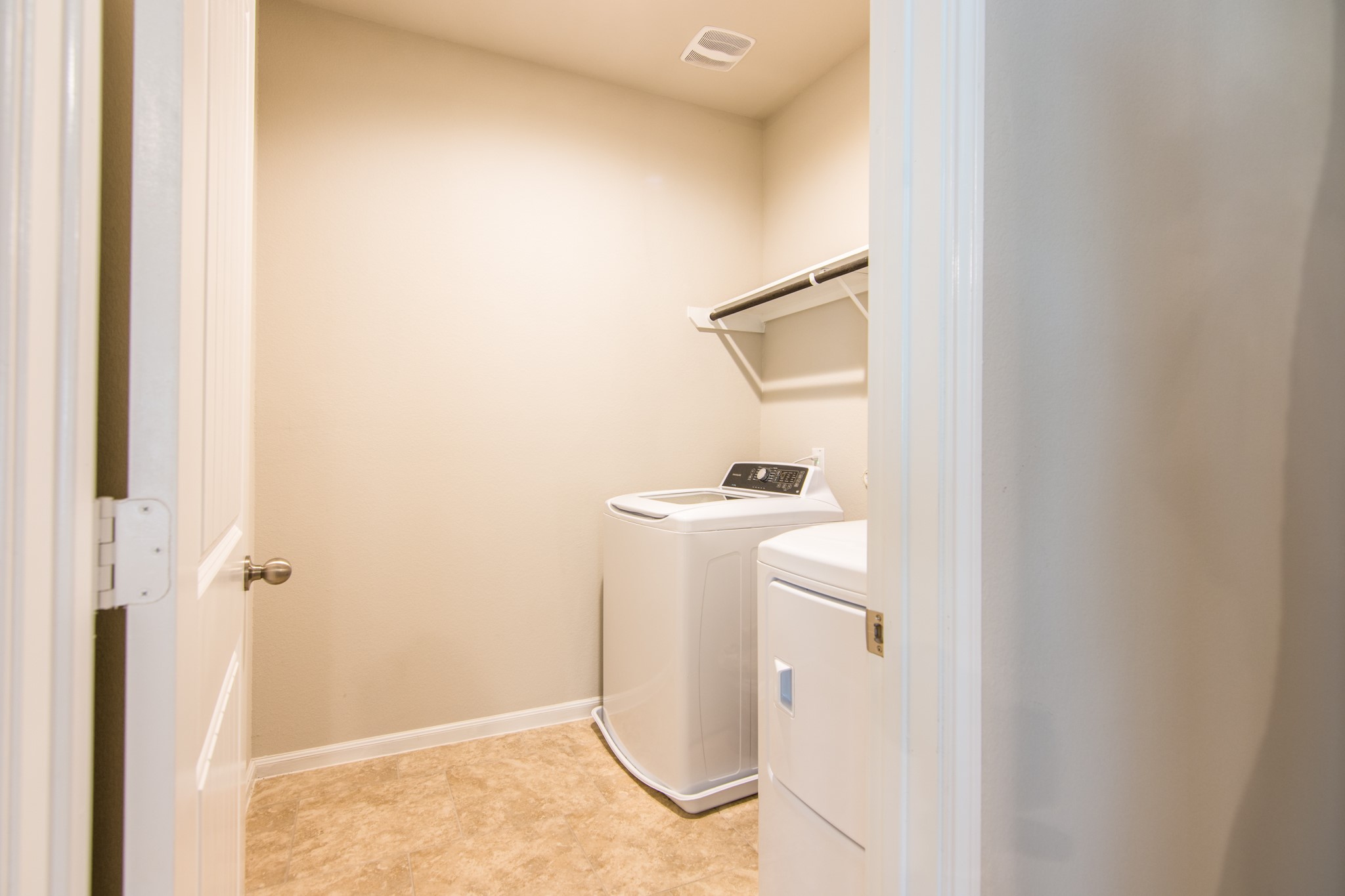 3311 Rainflower Springs Lane Rosenberg, TX 77471 - Photo 27 of 35 a utility room with dryer and washer