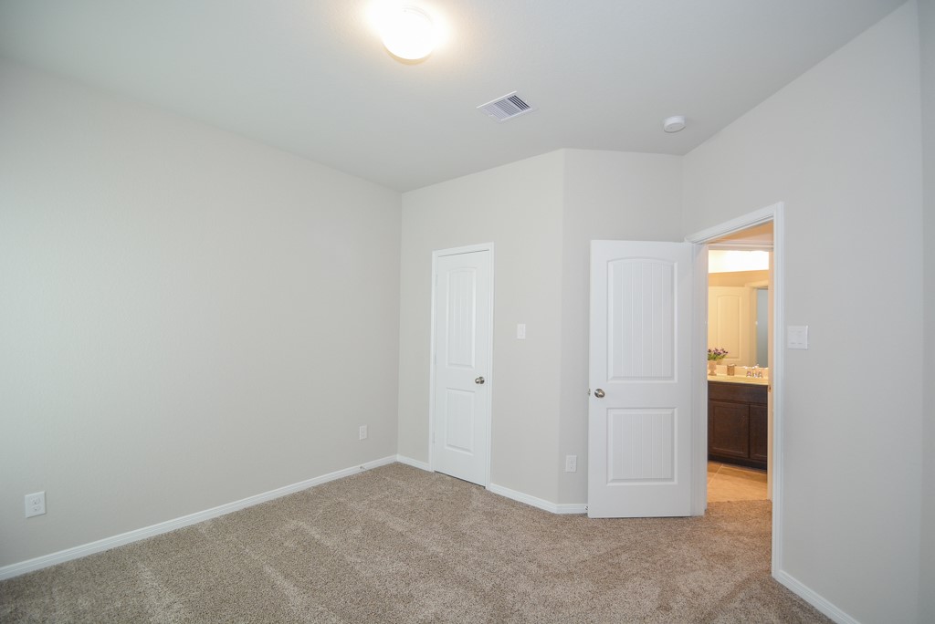 3311 Rainflower Springs Lane Rosenberg, TX 77471 - Photo 30 of 35 an empty room with closet