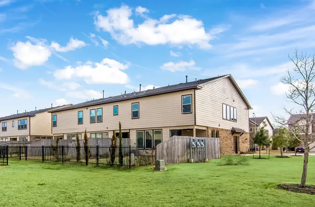 a view of living room kitchen with furniture and kitchen view